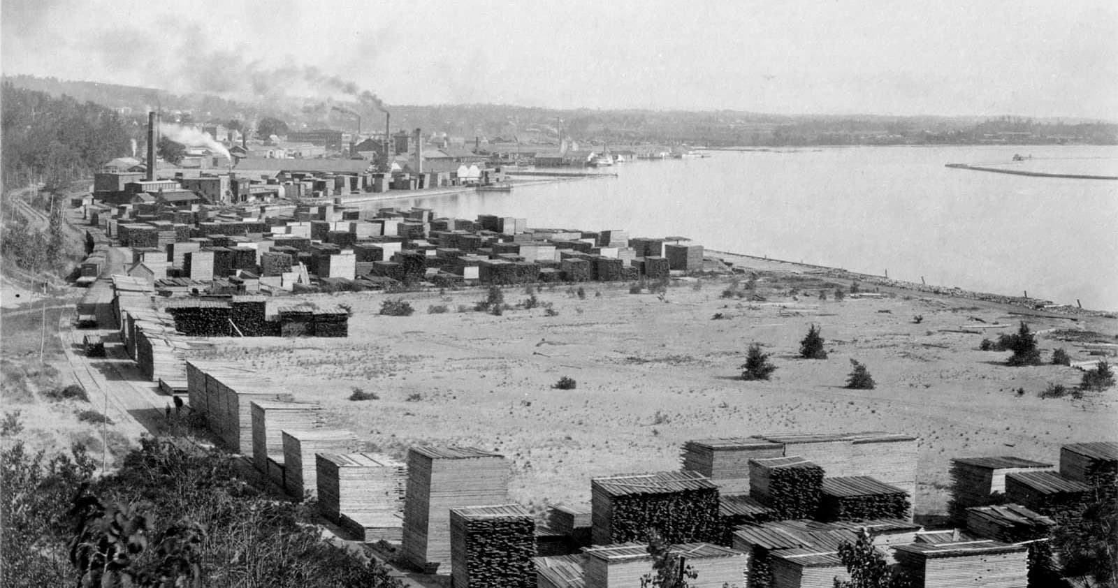 Historic coastal town with sandy shoreline panoramic beach view