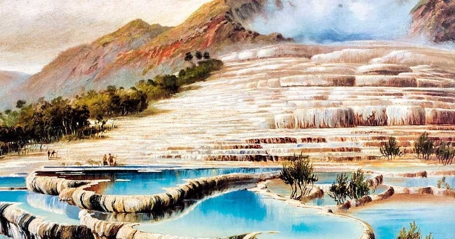 Walking along turquoise travertine terraces at geothermal springs