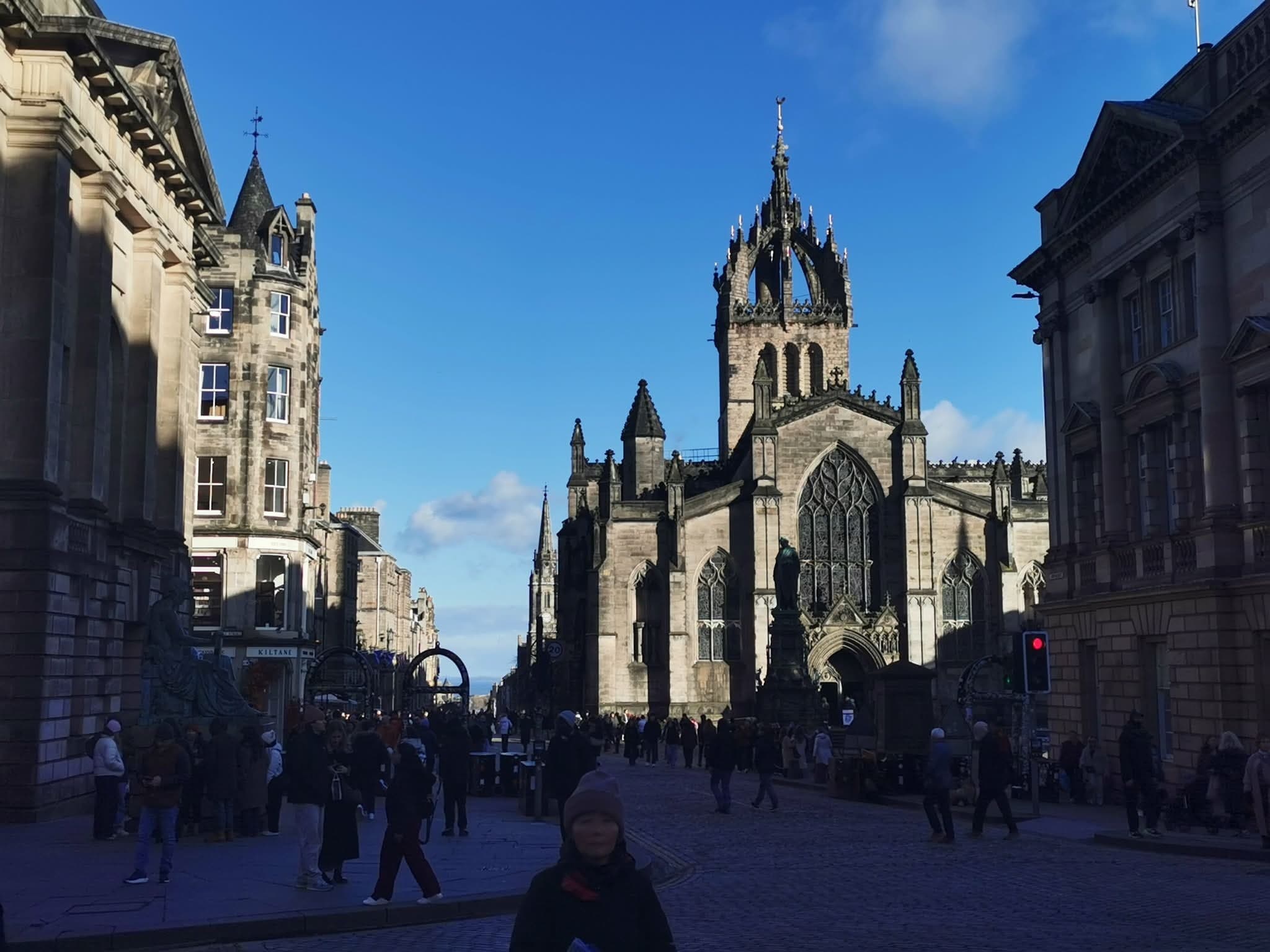 St Giles Cathedral silhouette on busy medieval Royal Mile