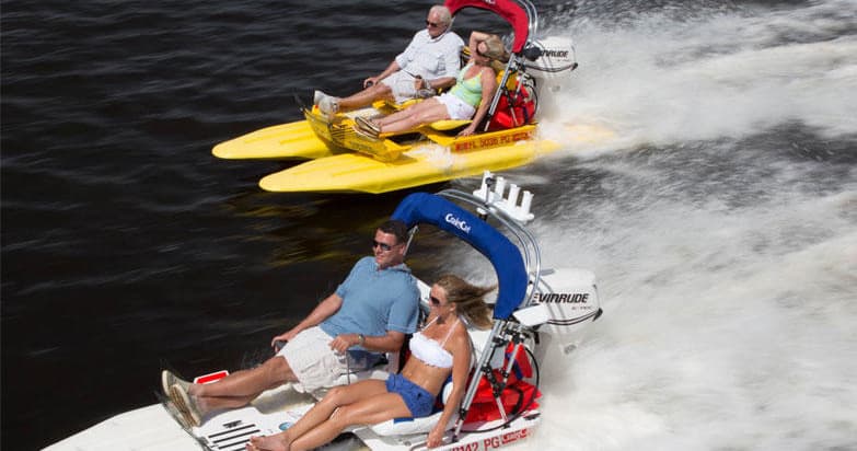 Two motorized backwater skiffs racing through Marco Island backwaters