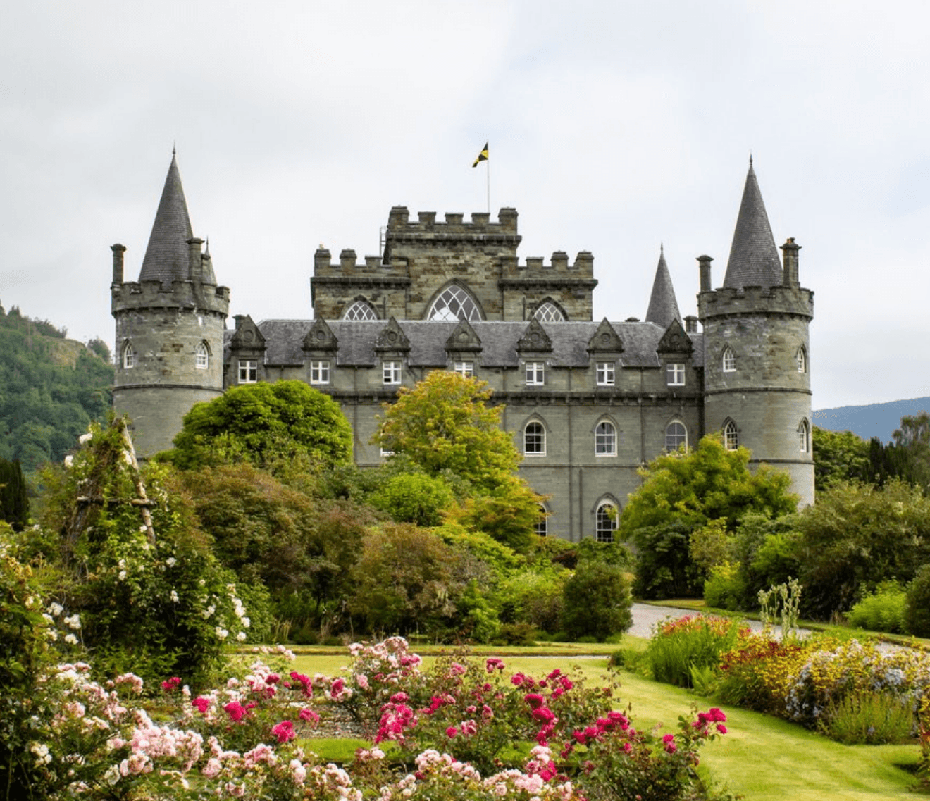 Historic Scottish castle with manicured gardens, scenic tour