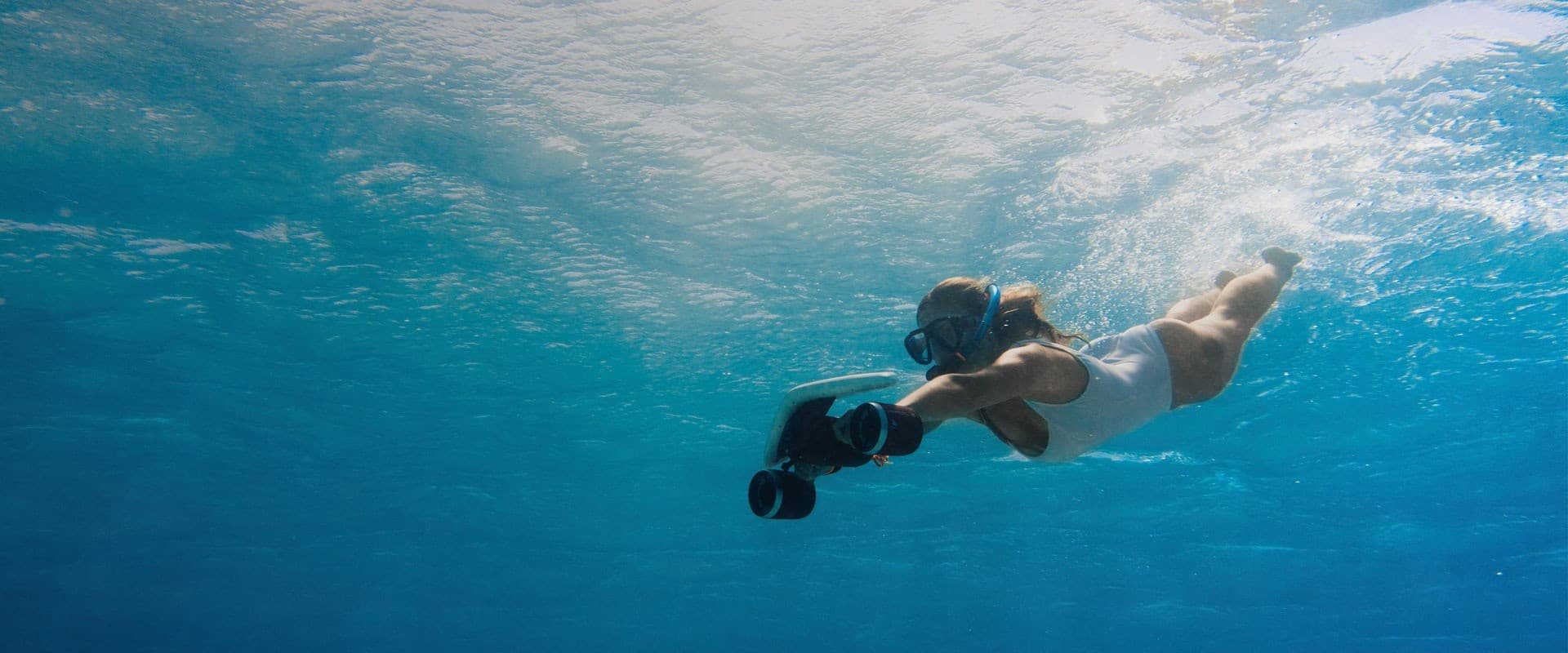 Glide Ibiza’s Shallow Seas: Sea Scooter Rides at Playa d'en Bossa