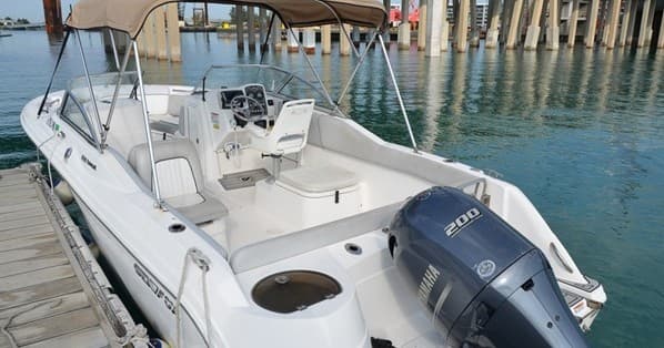 Open cockpit center-console boat at Jupiter Inlet boarding area