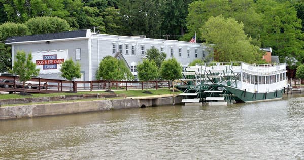 Paddlewheel sightseeing boat moored at Lockport canalfront dock