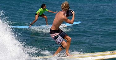 Ride the Waves with Ty Gurney Surf School in Waikīkī: Ultimate Surf Lessons for All Levels