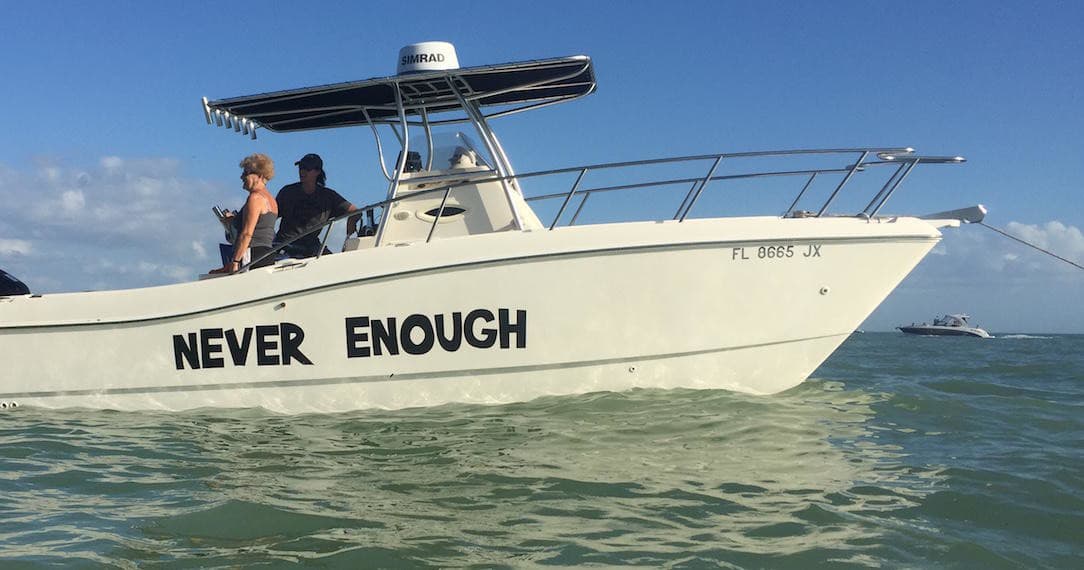 Fishing charter boat 'Never Enough' cruising coastal waters