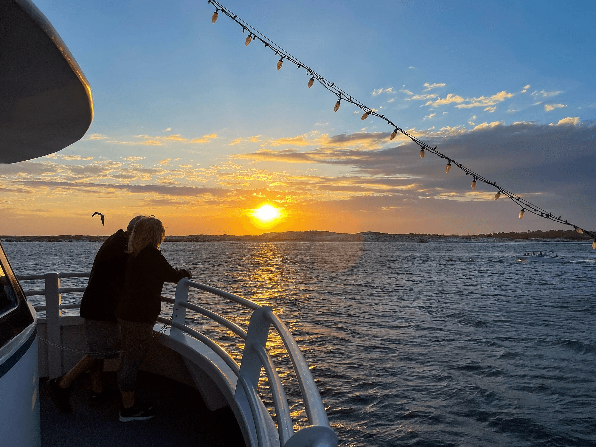 Sunset Dolphin Cruise in Destin: Gulf Coast Twilight & Crab Island Views