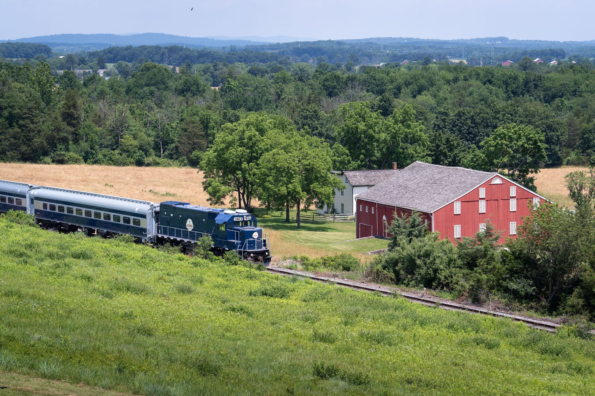 Scenic heritage train passing farmland near Gettysburg, countryside tour
