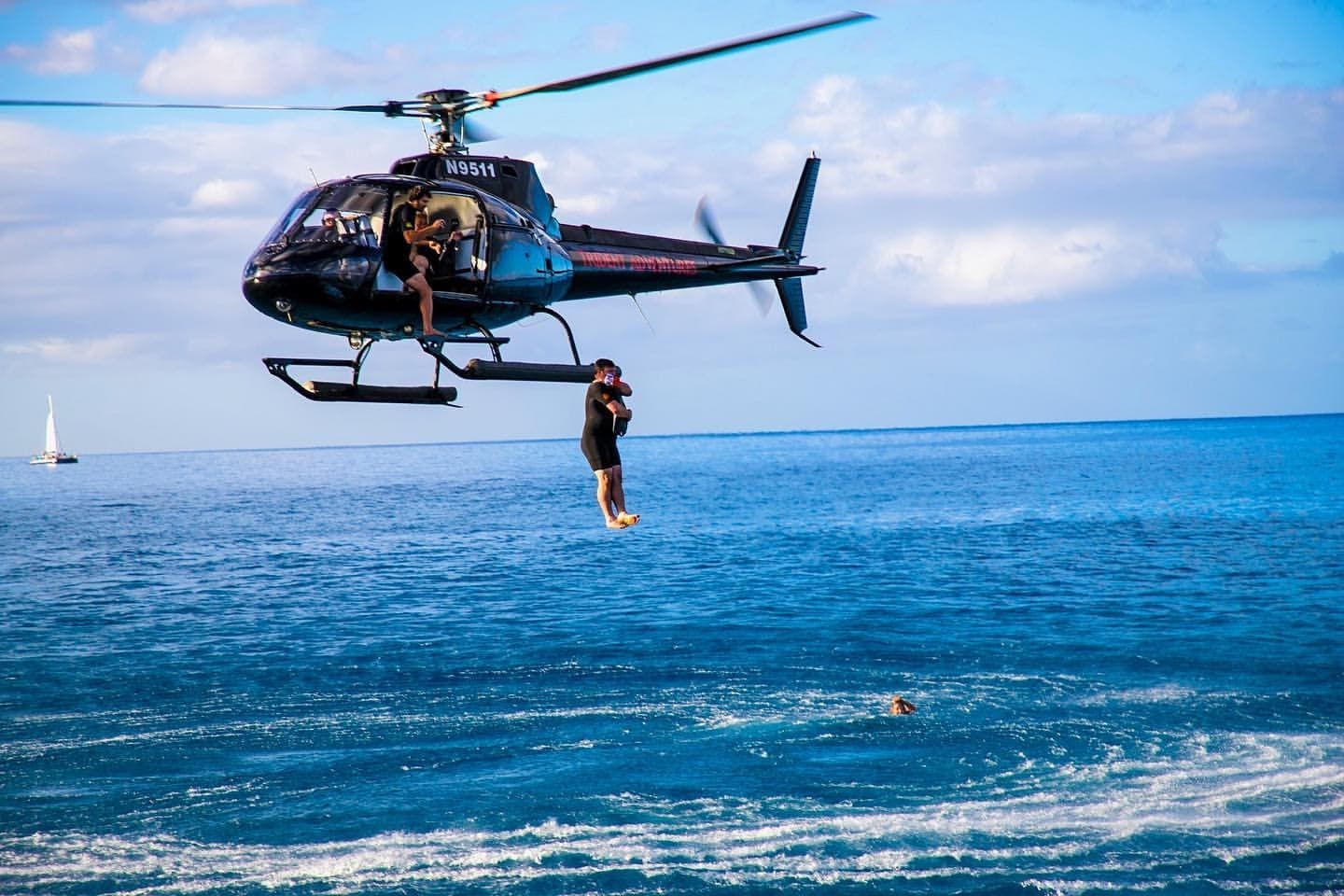 Helicopter ocean insertion rescue training over sea