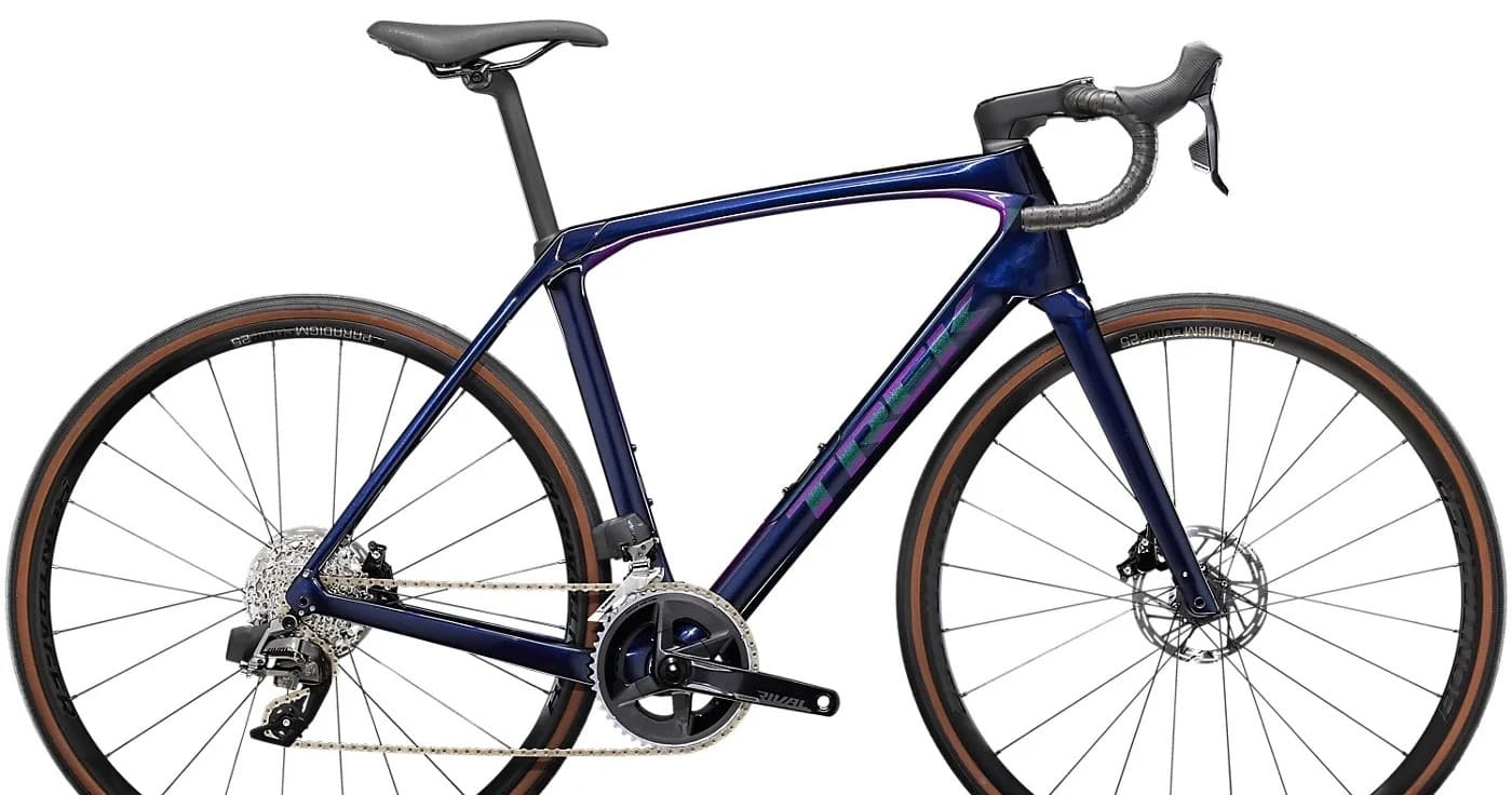 Blue carbon road bike studio shot on white background