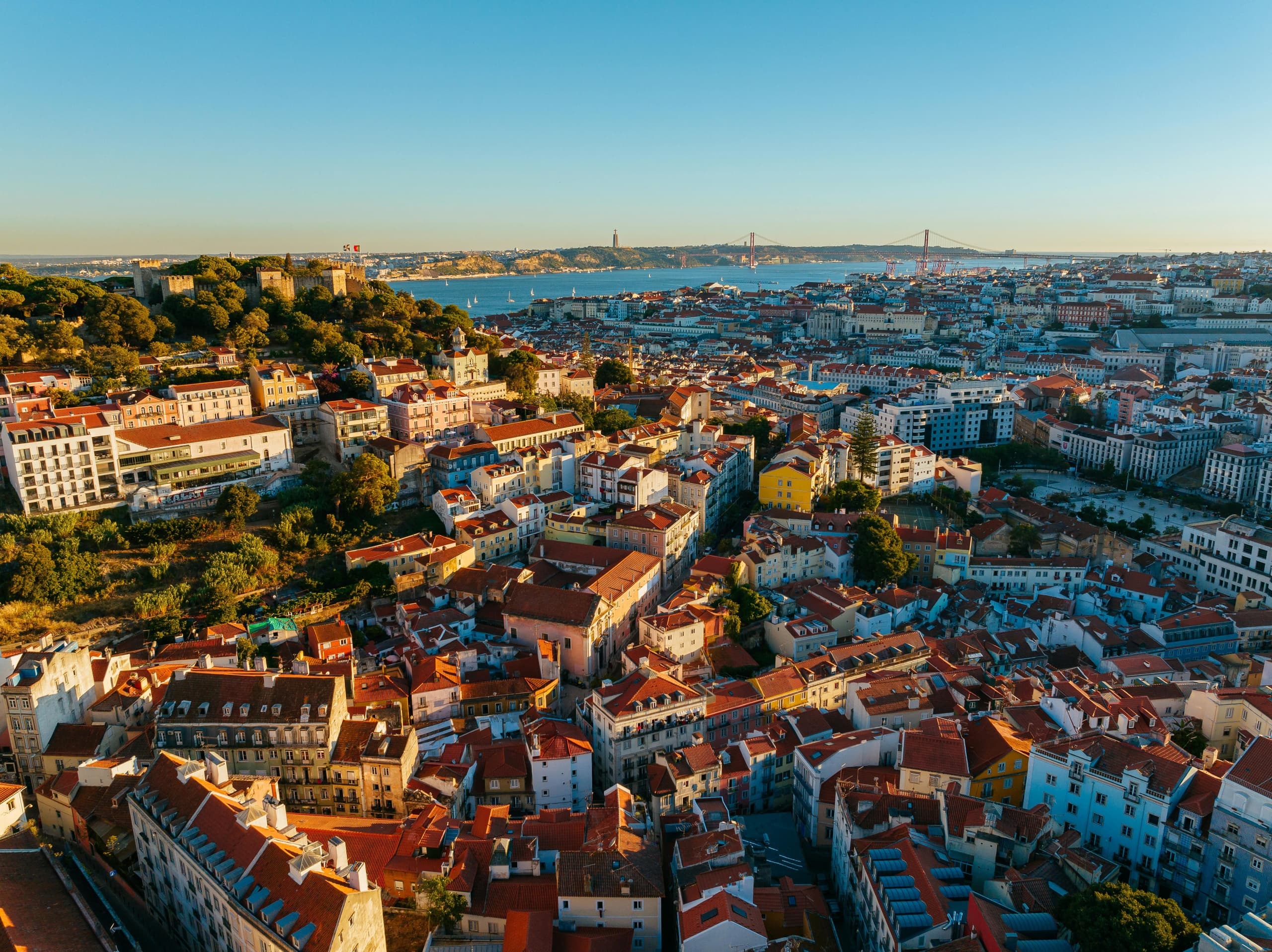 Panoramic Lisbon cityscape from miradouro viewpoint over rooftops