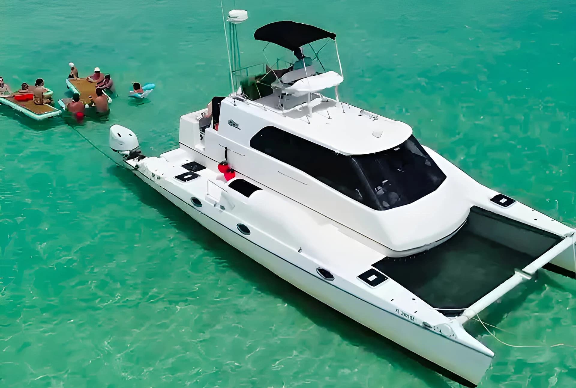 Full-Day Catamaran Charter to Crab Island from Miramar Beach photo 4