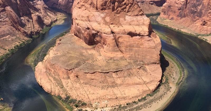 Aerial view of Horseshoe Bend river meander in desert canyon