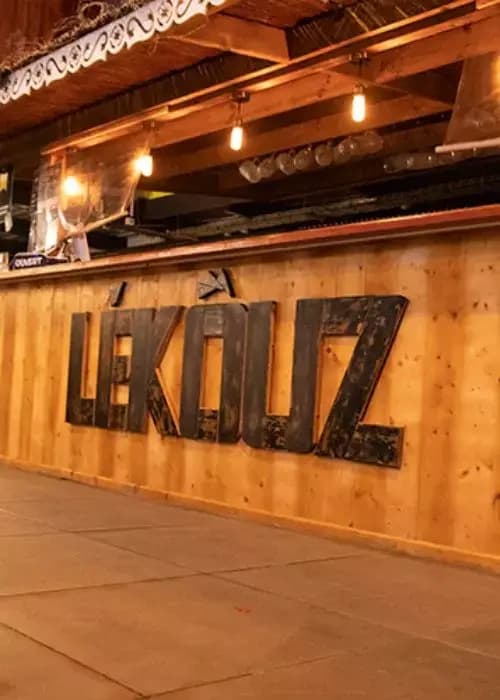 Wooden brasserie bar interior with warm lighting for casual dining