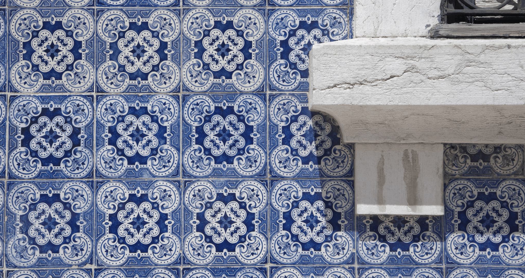 Traditional blue azulejo tiles on Lisbon building exterior