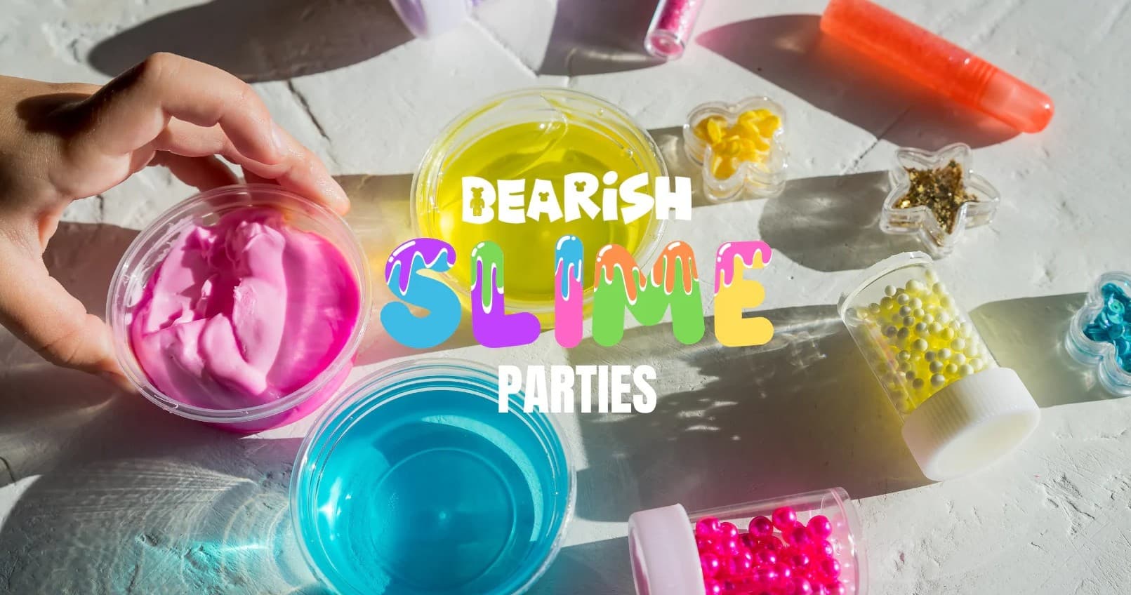 Hands mixing colorful slime during an indoor slime party
