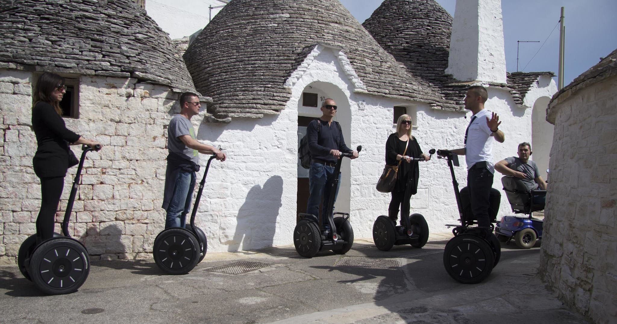 Group on Segways touring traditional trulli houses in Puglia