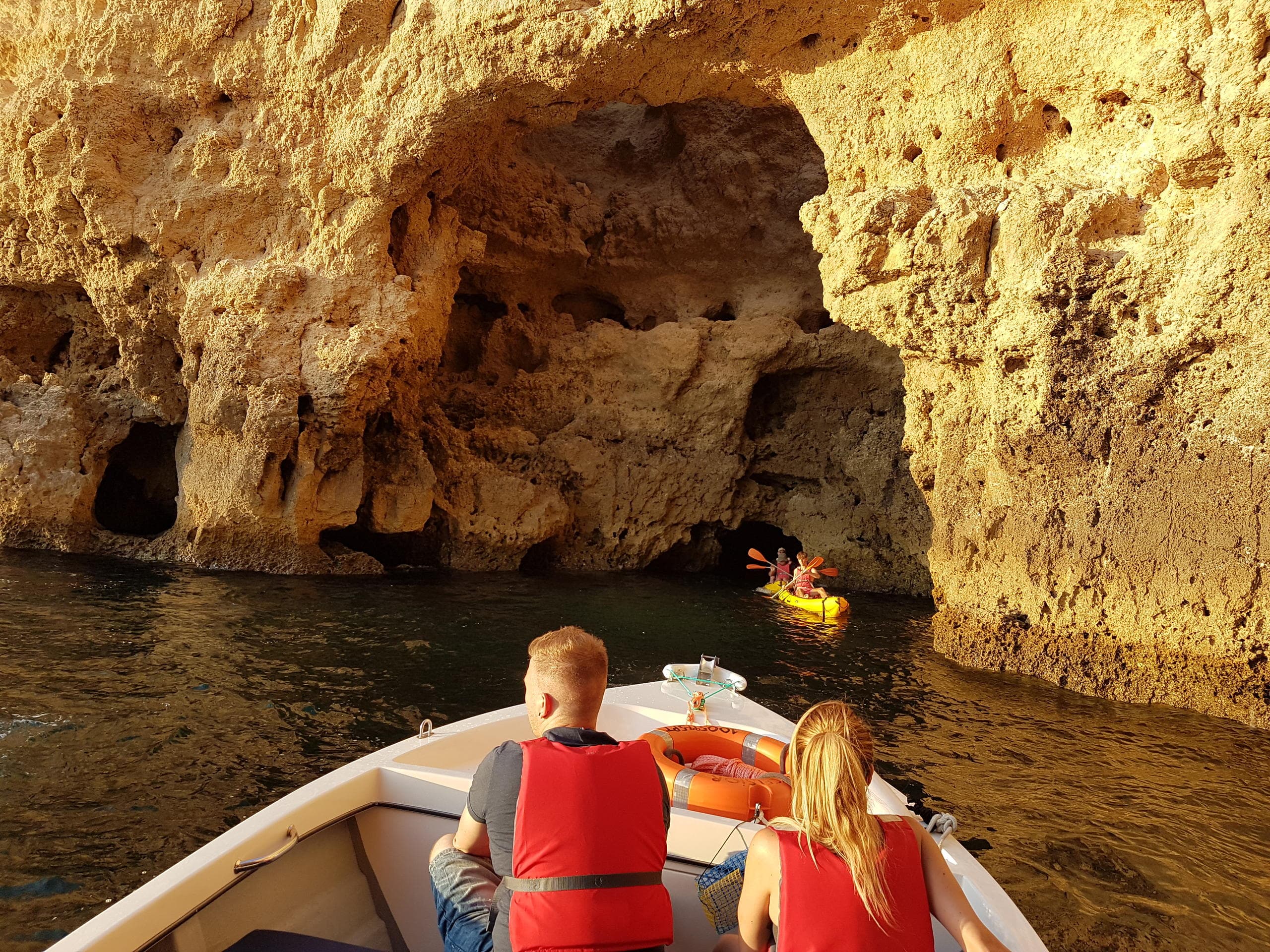 Scenic coastal arch and emerald sea viewed from a boat tour
