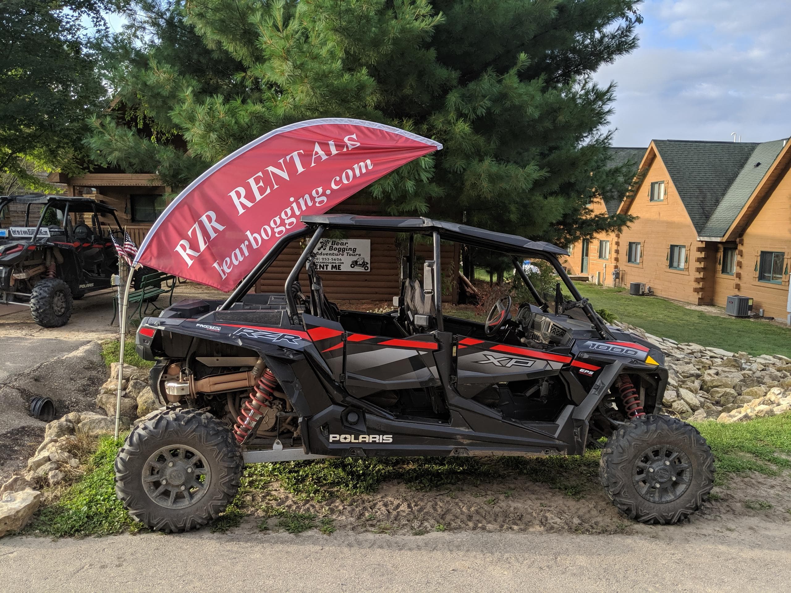 Polaris RZR side-by-side by cabins ready for off-road trail rentals