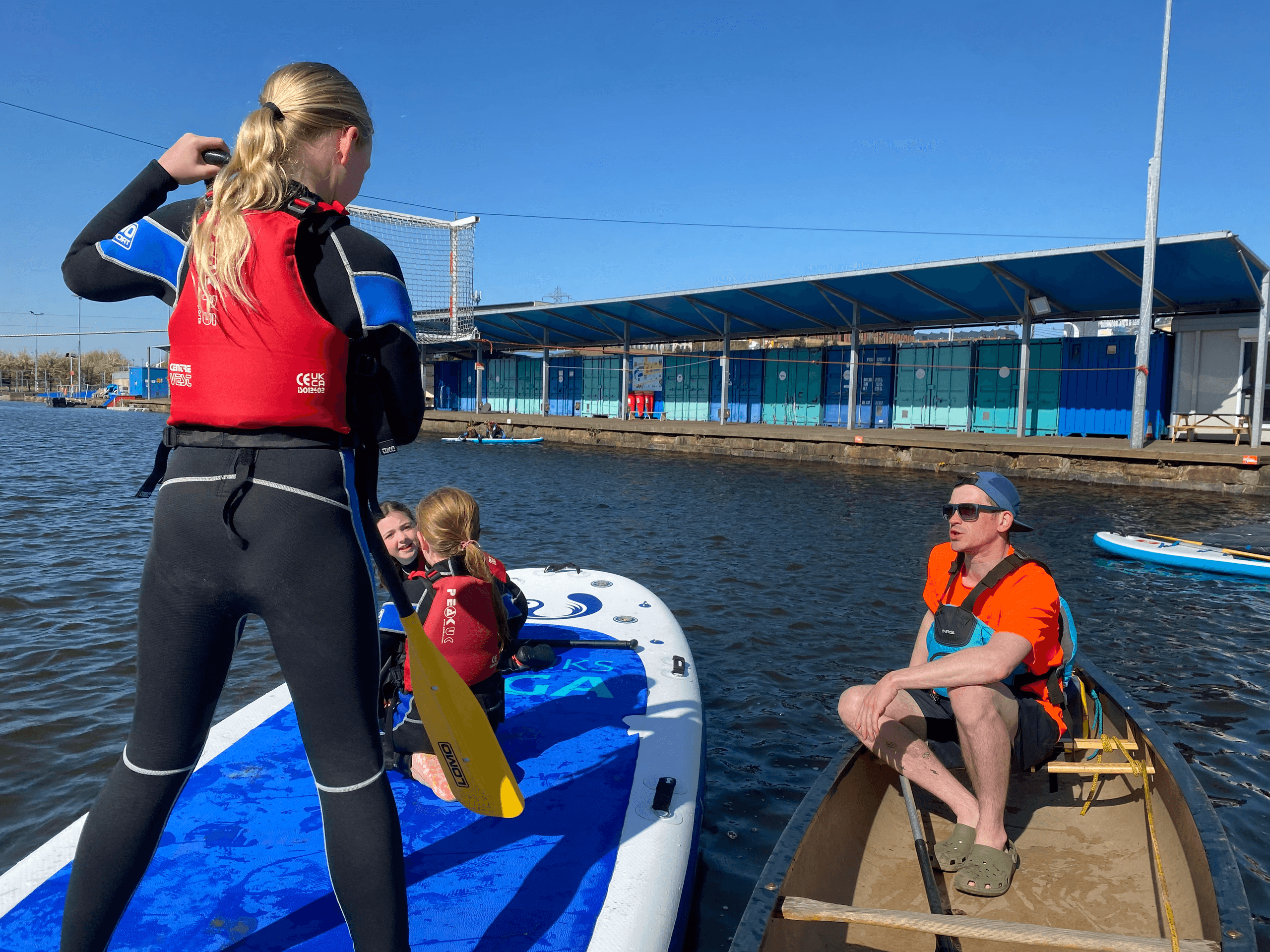 Water Activities at Pinkston Watersports: Family Paddleboarding Adventure