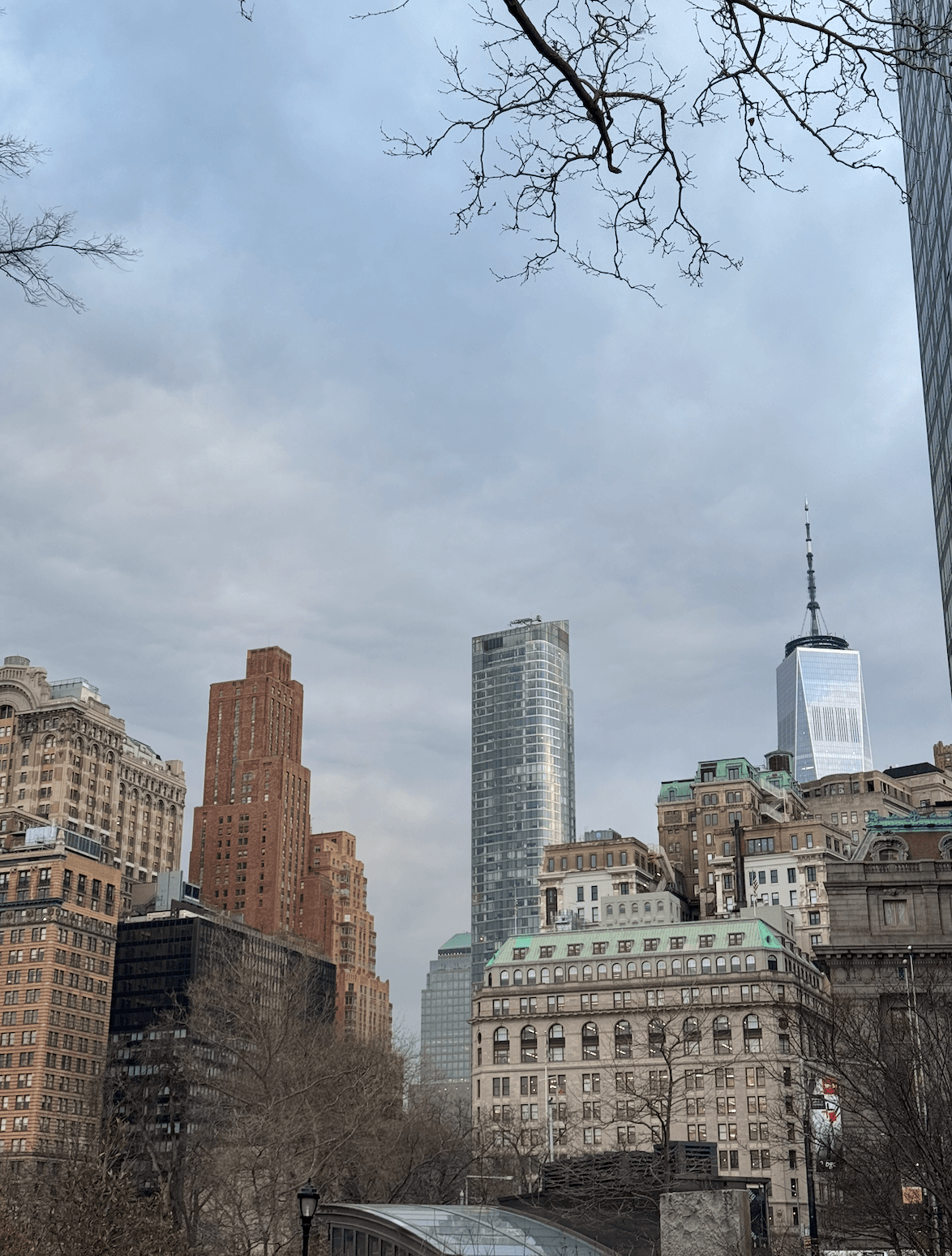 Downtown Manhattan view featuring One World Trade Center tower