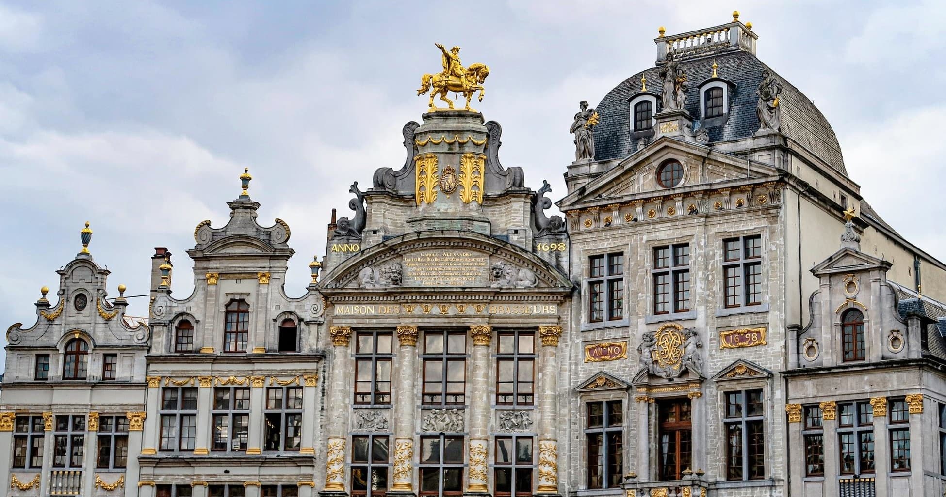 Ornate guildhouse facades at Brussels Grand Place square