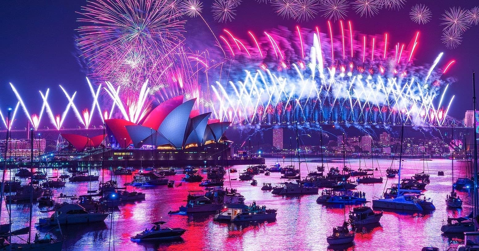 Harbor cruise viewing Sydney Opera House and fireworks over bridge