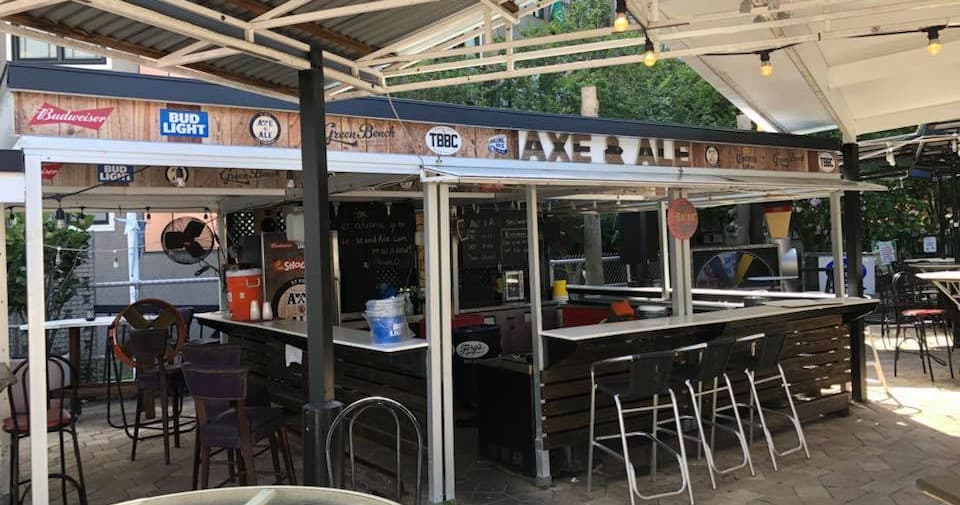 Outdoor beer patio and bar adjacent to St. Pete axe lanes