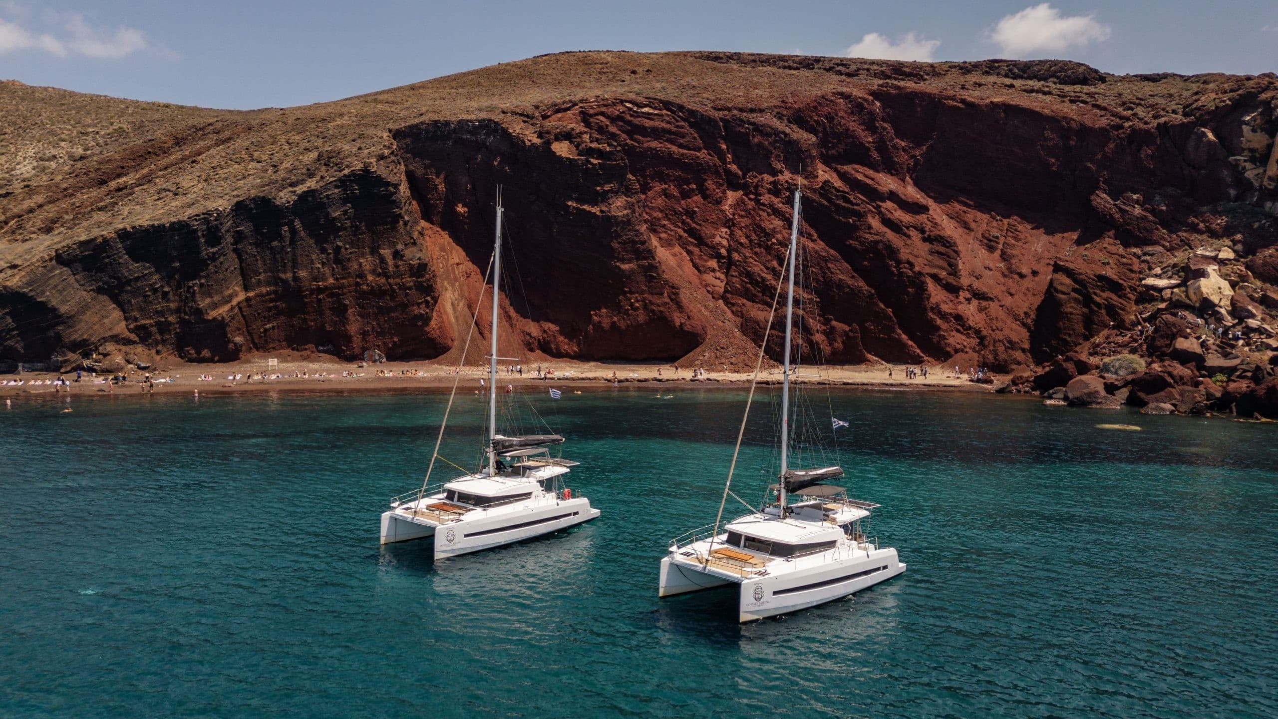 Santorini Hidden Beaches Swim Adventure: 3-Hour Private Catamaran Cruise