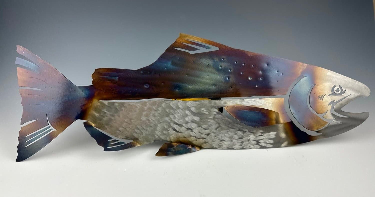 Decorative metal salmon sculpture representing Sitka fishing heritage