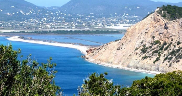 Cliffside bay and coastal trail overlooking Mediterranean waters