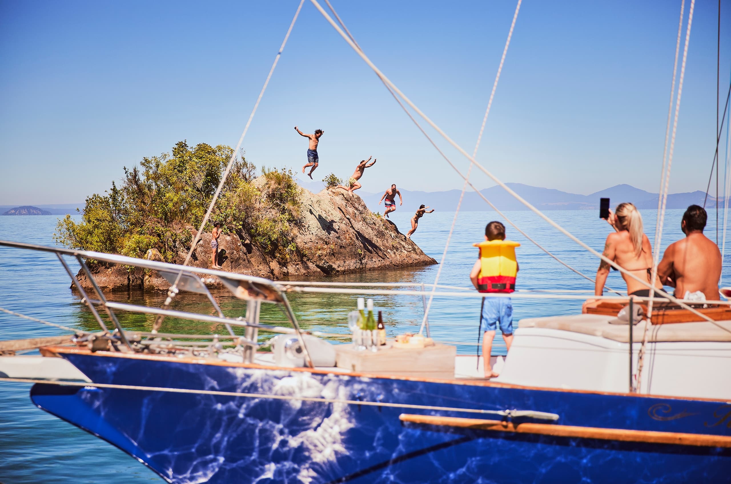 Water Activities & Māori Rock Carvings at Taupo Sailing Adventures