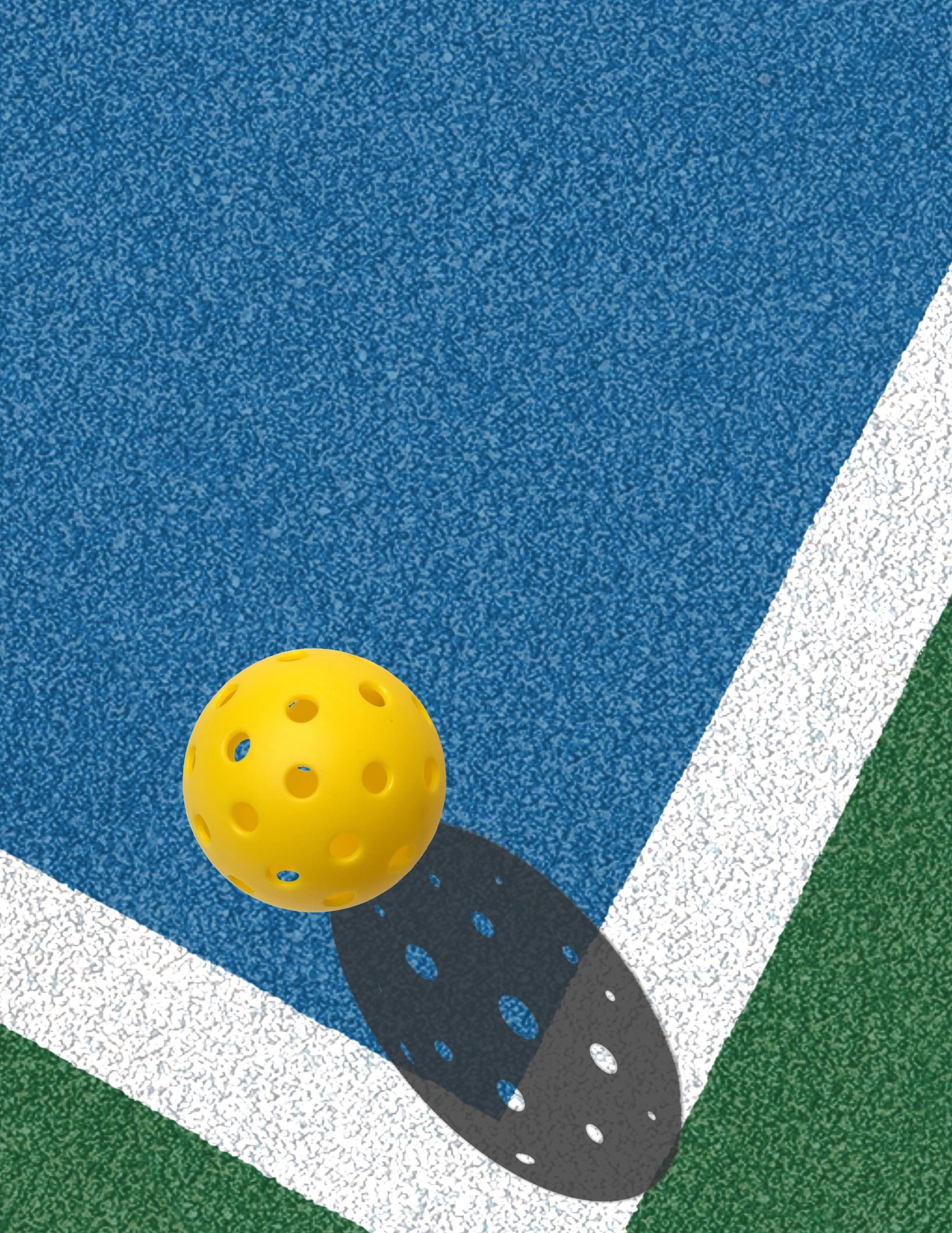 Yellow pickleball bouncing near court lines on outdoor court