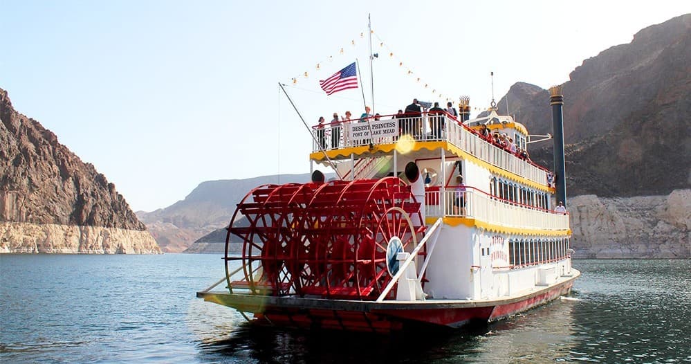 Paddlewheel sightseeing boat cruising on Lake Mead reservoir