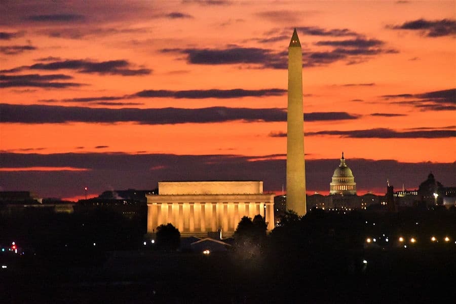 Experience Sunrise Over Washington from Arlington
