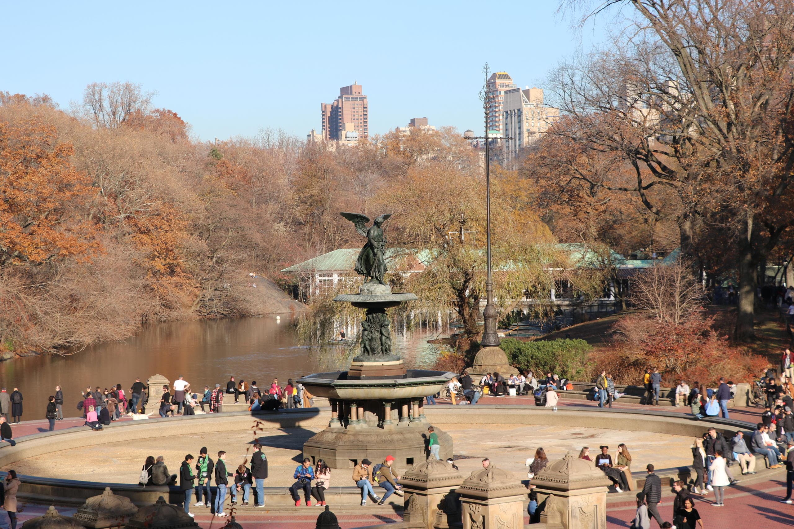 Bethesda Terrace fountain with visitors in Central Park autumn