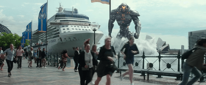 Crowd running on waterfront promenade with cruise ship and robot