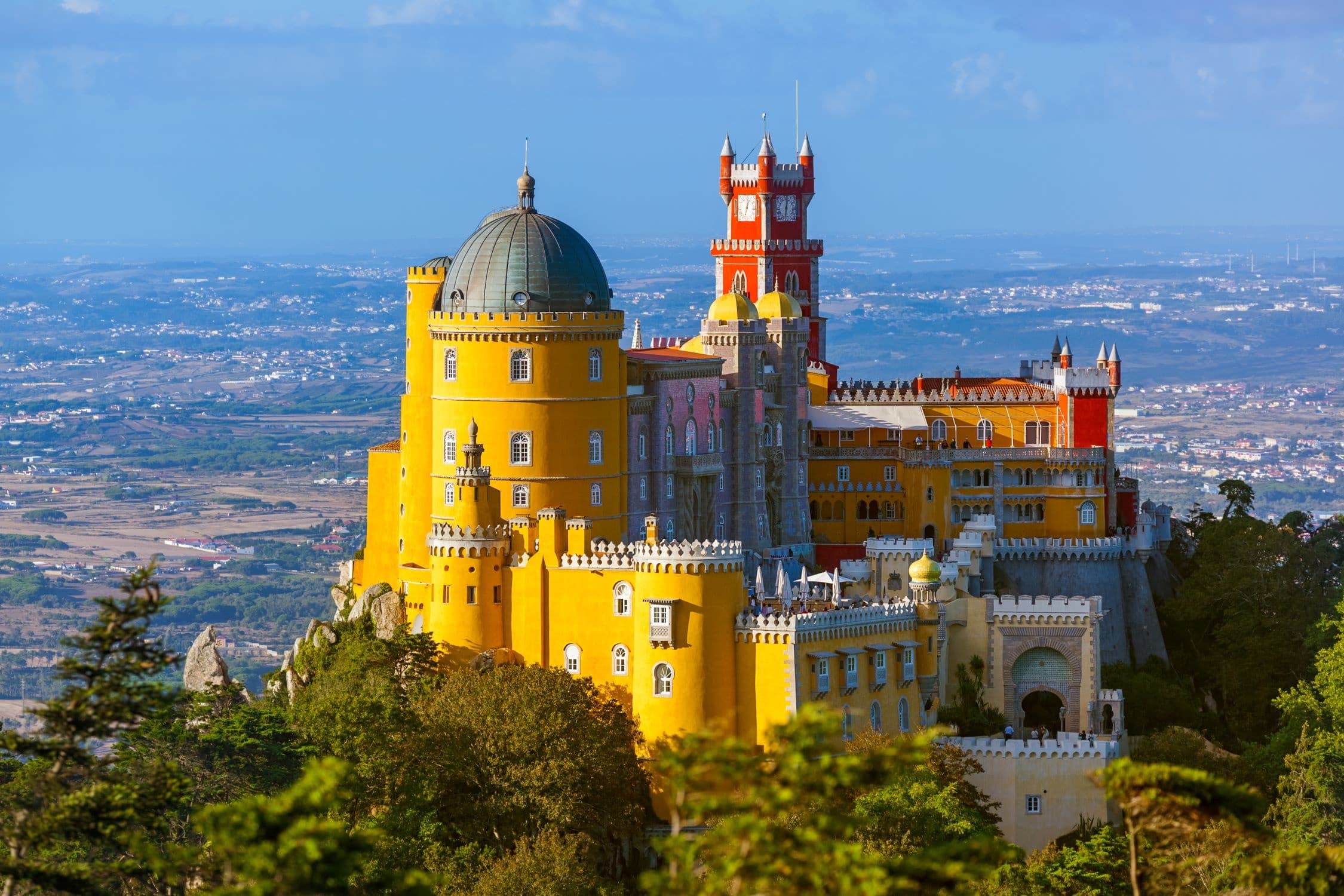Pena Palace yellow castle seen from scenic hillside viewpoint