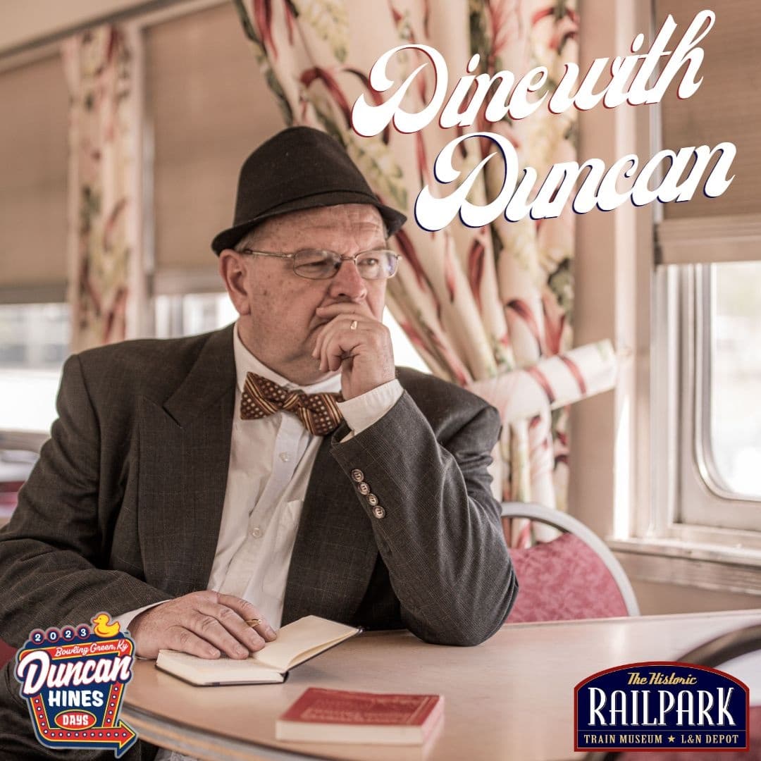 Dining car portrait aboard RailPark vintage train showing seated guest