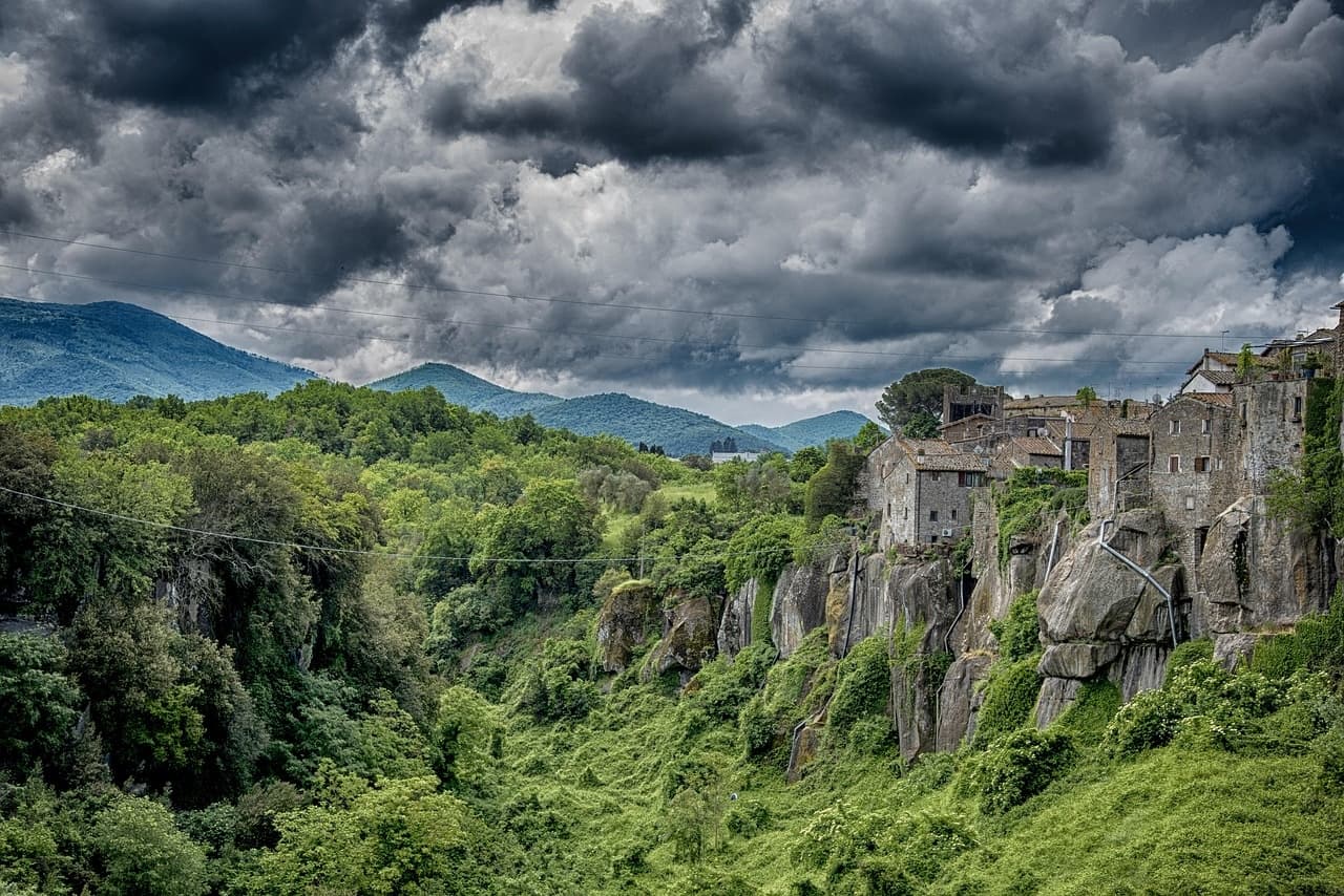 Dramatic green valley panorama for hiking in Italy