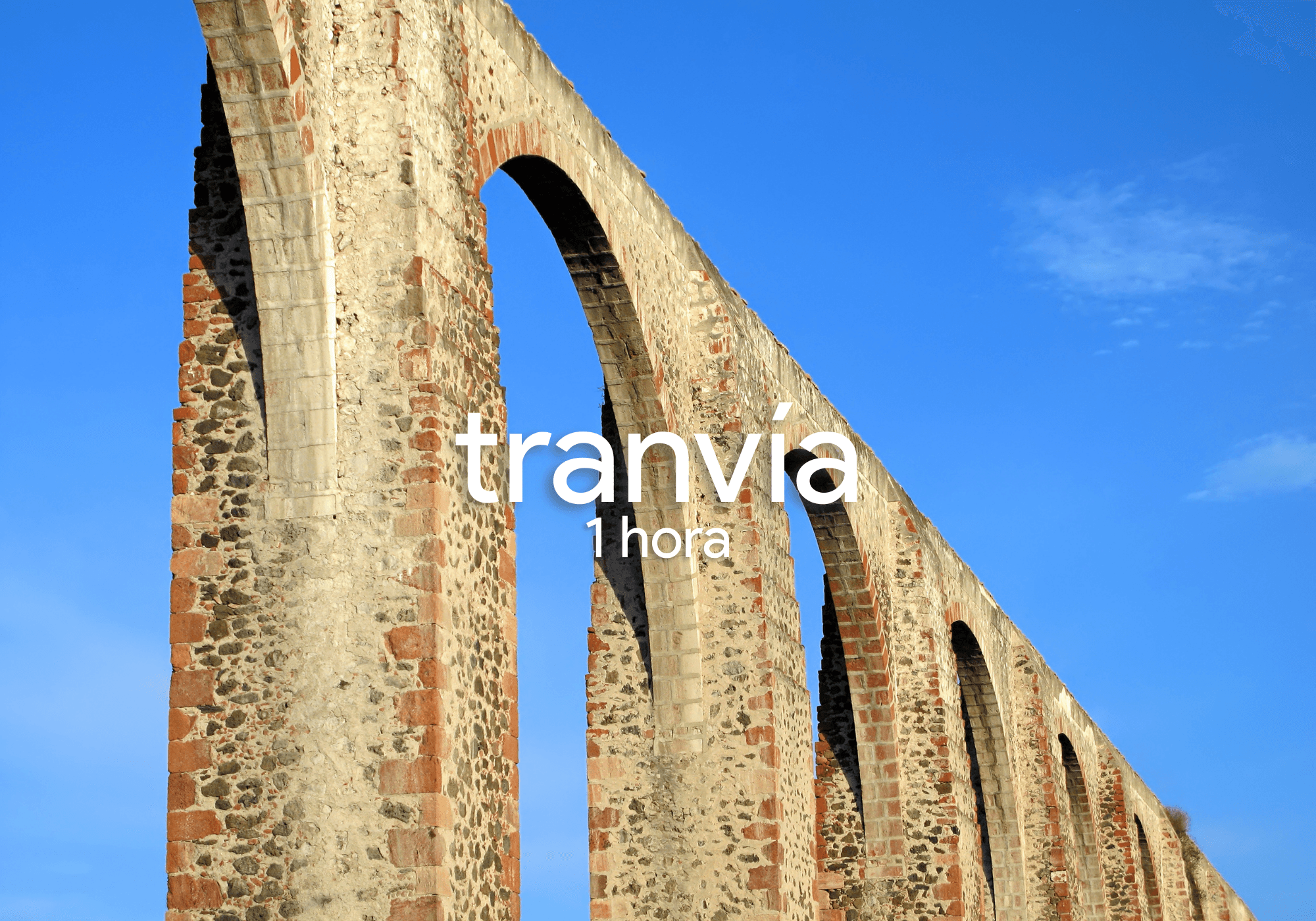 Historic Queretaro aqueduct arches under blue sky for sightseeing