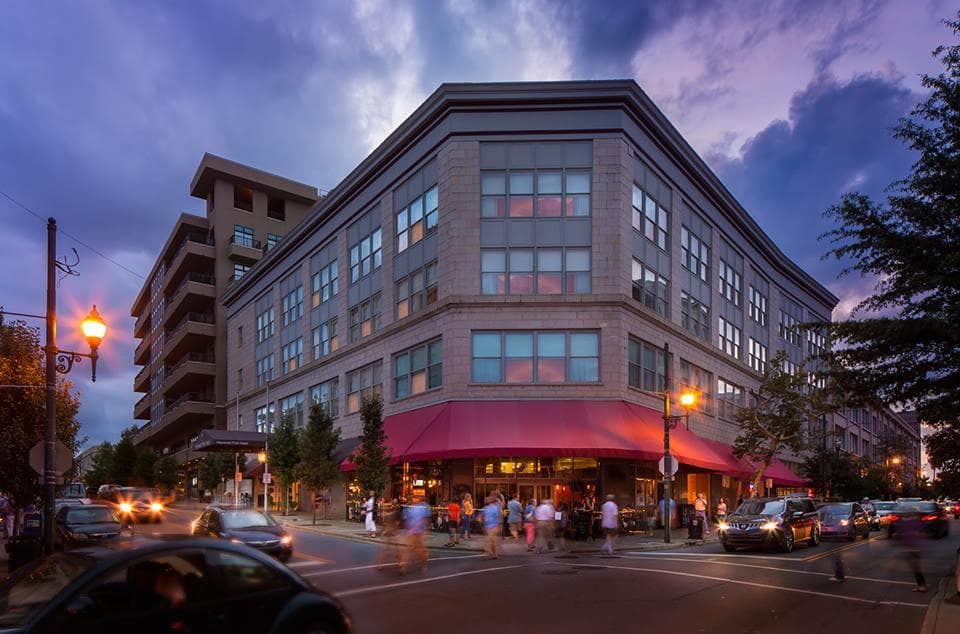 Downtown Asheville streetscape with restaurants and evening light