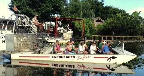 Guided airboat safari with passengers exploring Everglades waterways