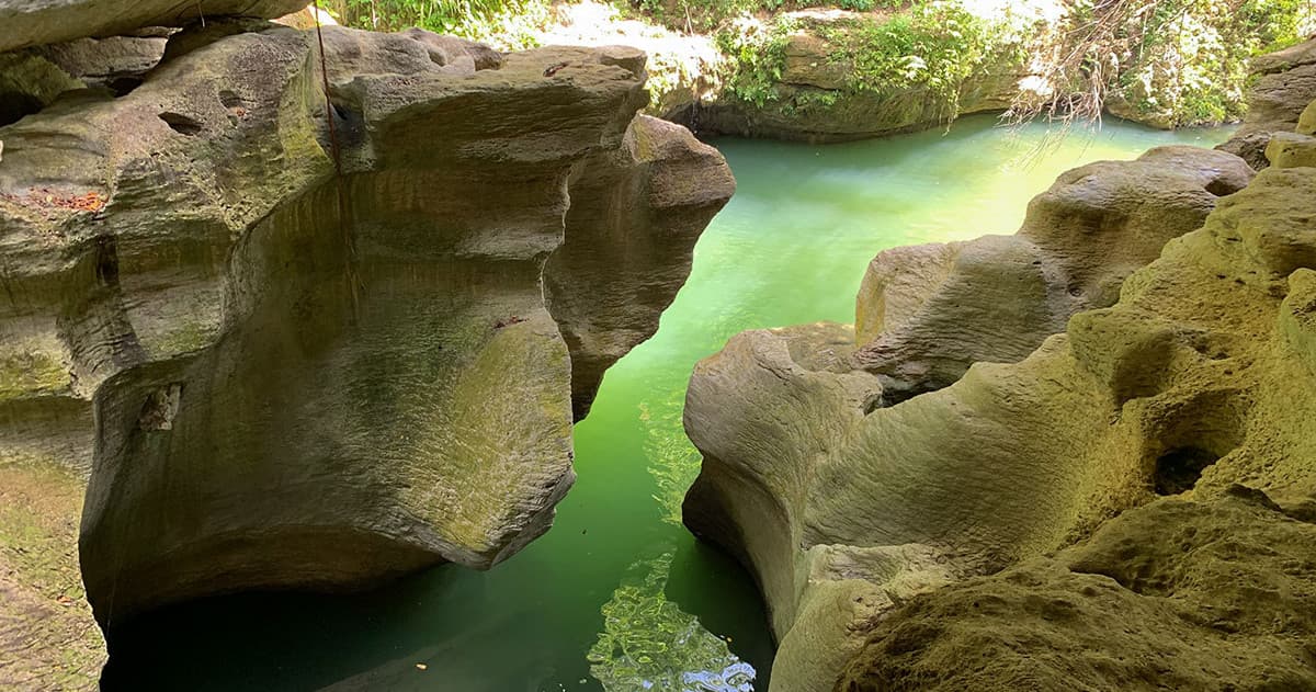 Tropical river canyon with emerald pools for swimming, Puerto Rico