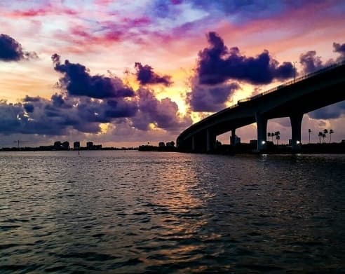 Sunset waterfront with bridge over Clearwater Bay, scenic view