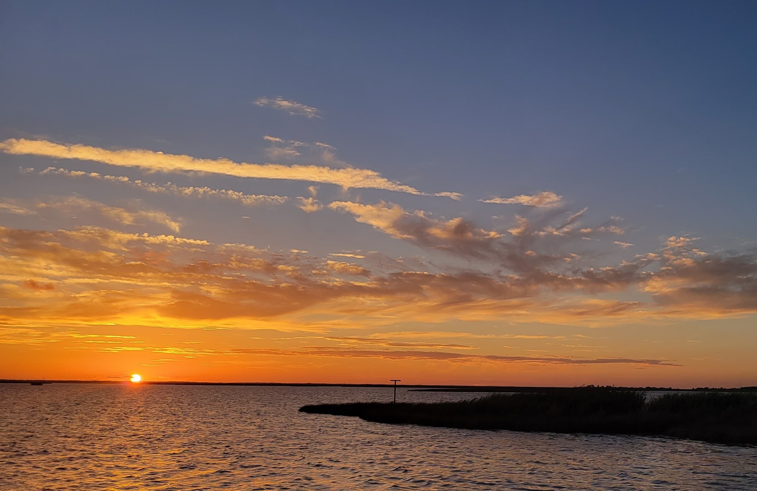 Currituck Sound Sunset Cruise: Private Captained Evening Sail from Duck, NC