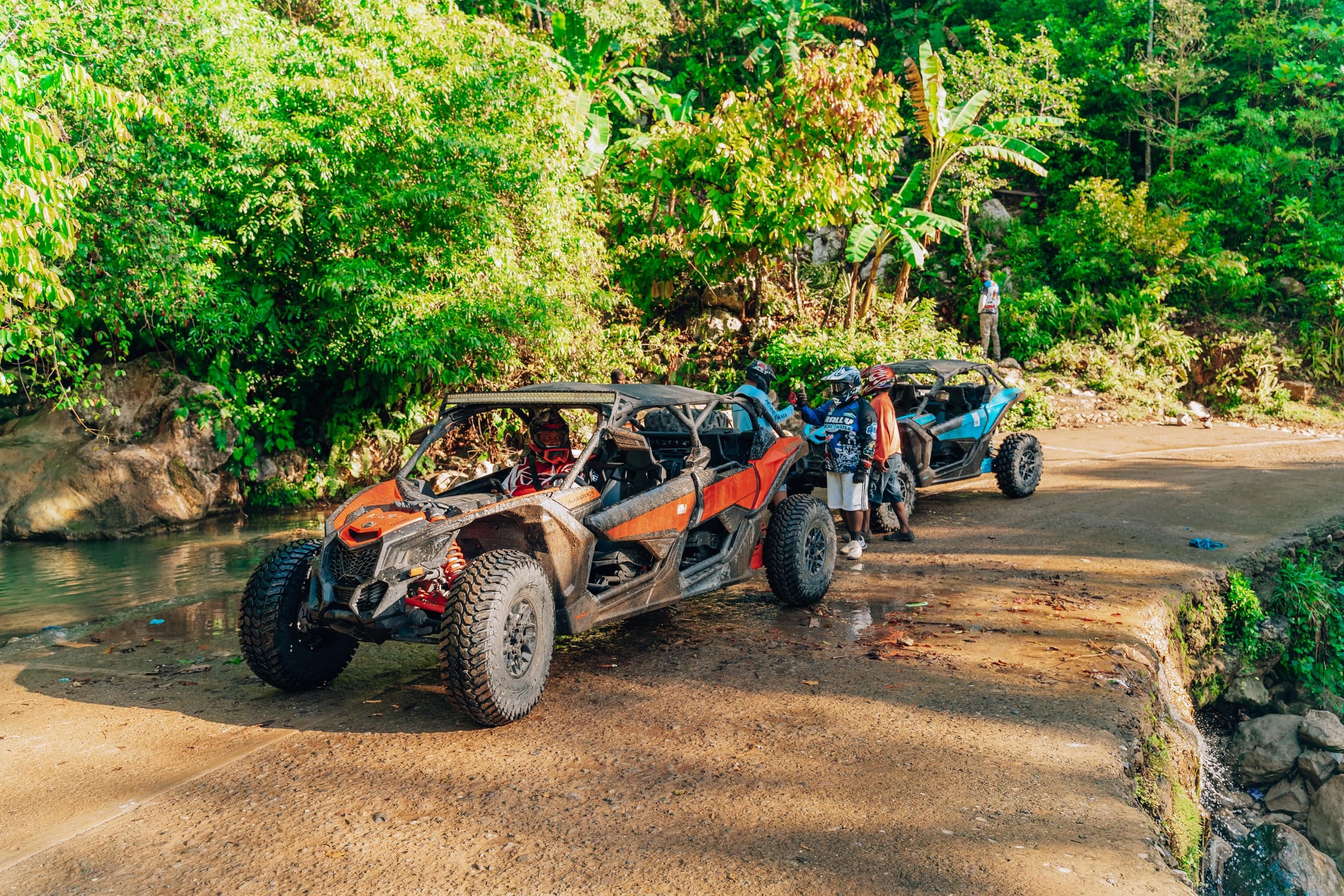 Dune buggies driving on tropical trail for off-road tours