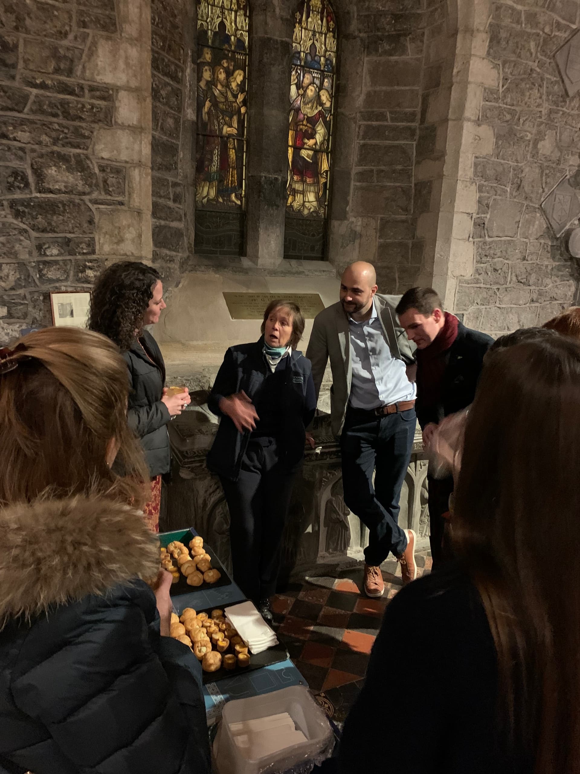 Guided historical tour and group inside St Canice's Cathedral interior
