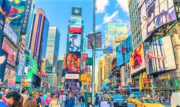 Crowded Times Square street scene, vibrant New York city tour