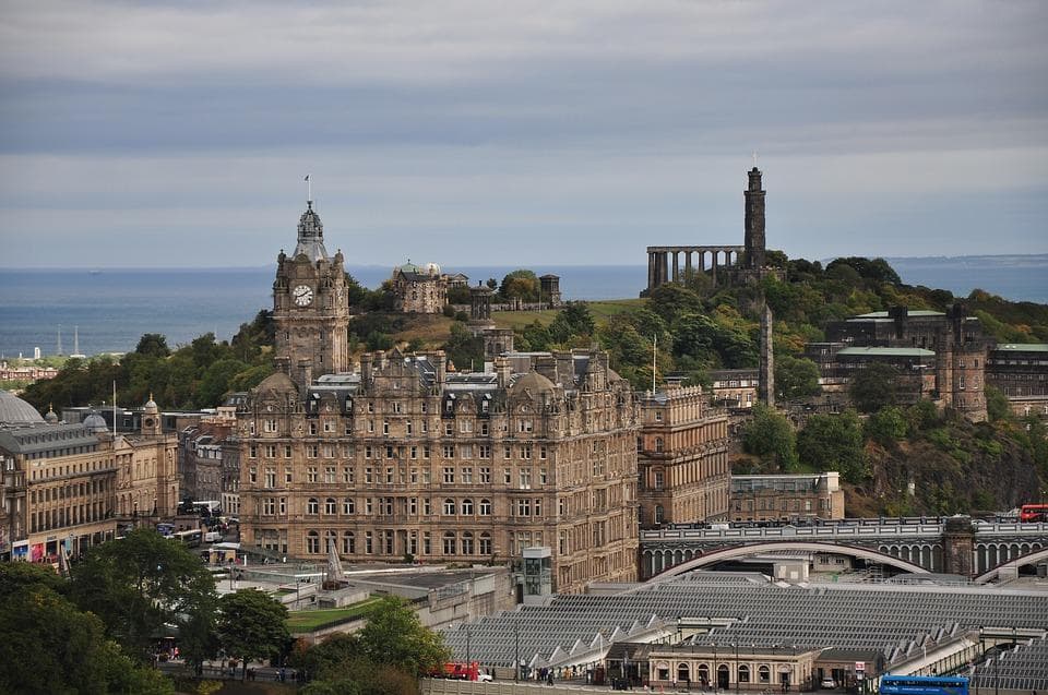 Aerial coastal view of Edinburgh skyline and Calton Hill